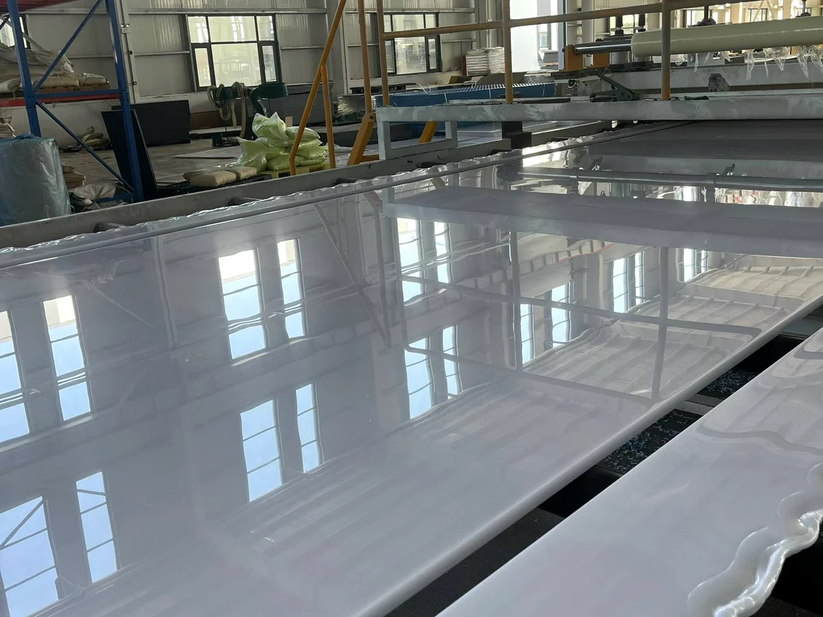 Smooth light-coloured sheets beside processing equipment